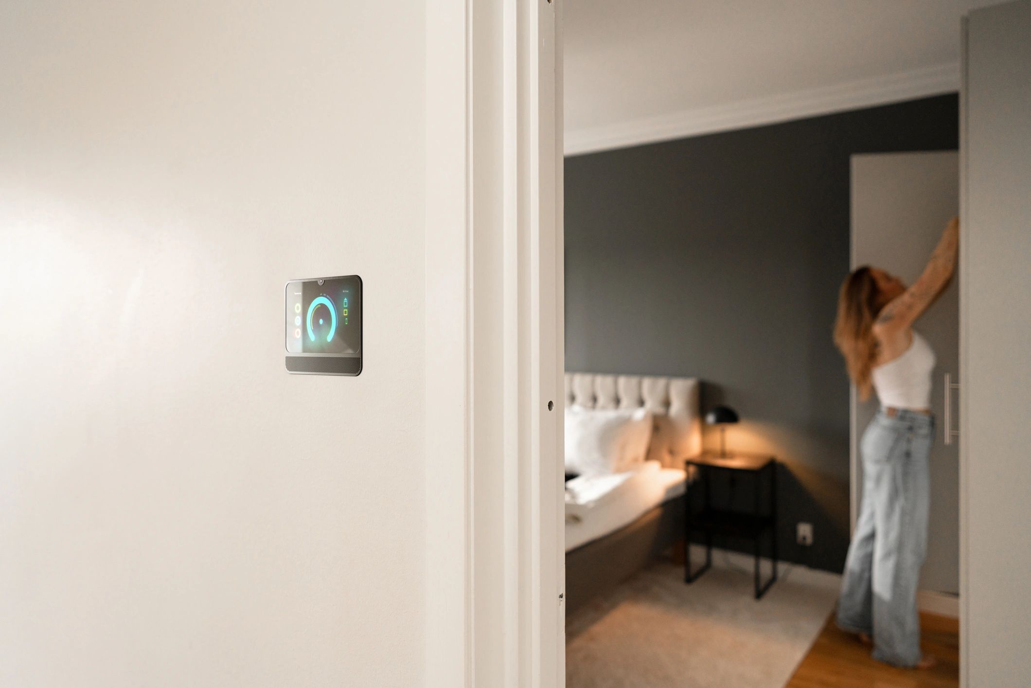 Modern home interior with smart thermostat panel